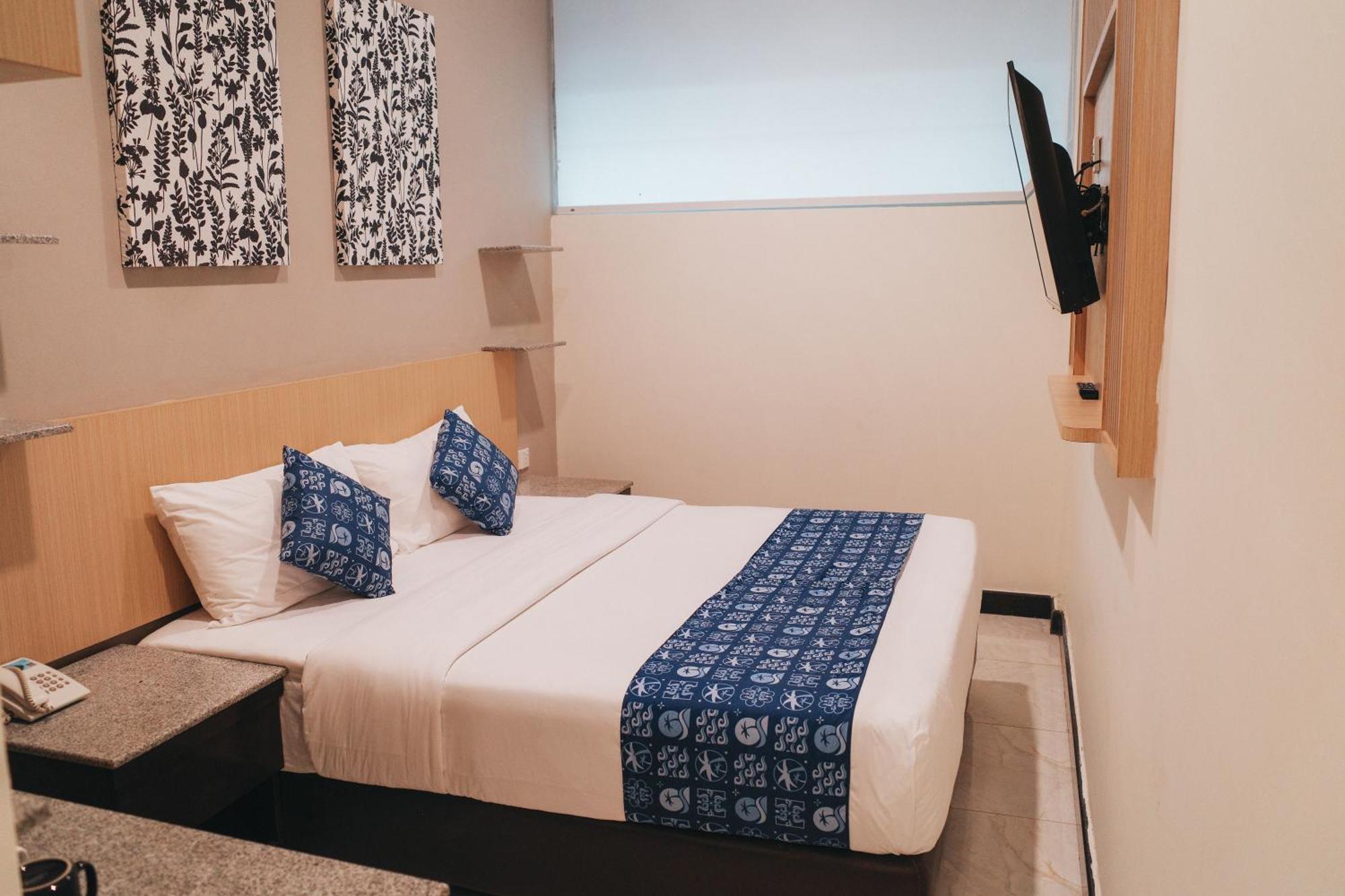 Batam Harbour Boutique Hotel & Spa Нагоя Номер фото